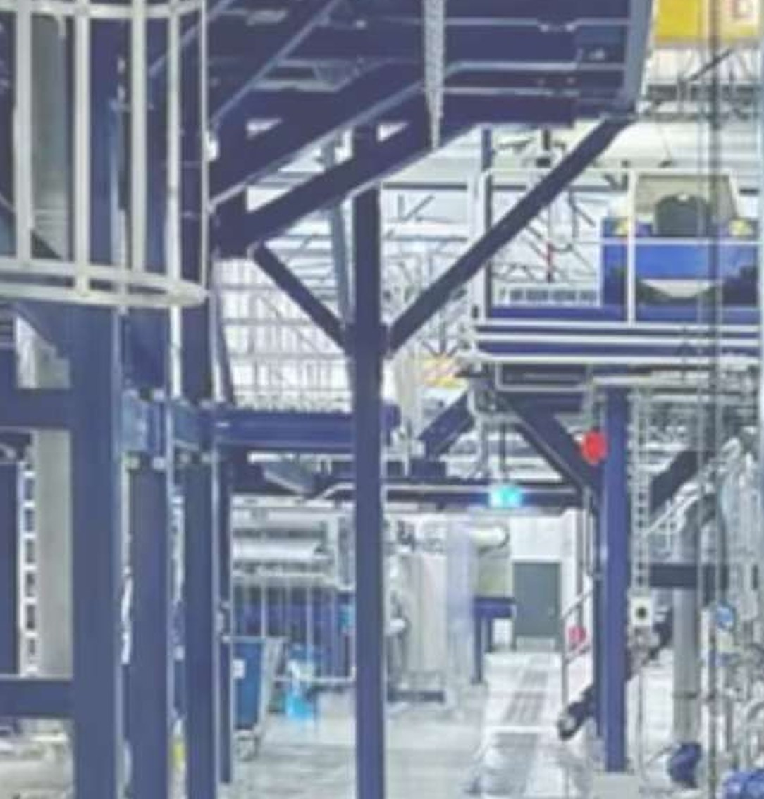 Process hall of a cellulose plant with structural steel, piping and floor drainage